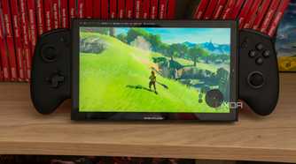 A ONEXPLAYER X1 Mini gaming handheld running The Legend of Zelda Breath of the Wild in an emulator running on Bazzite