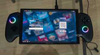 A ONEXPLAYER X1 Mini gaming handheld displaying the login screen for the Steam gaming UI upside down