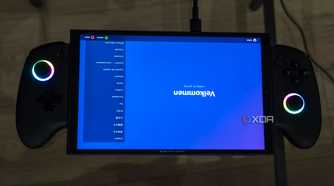 A ONEXPLAYER X1 Mini gaming handheld displaying the welcome screen for the Steam gaming UI upside down