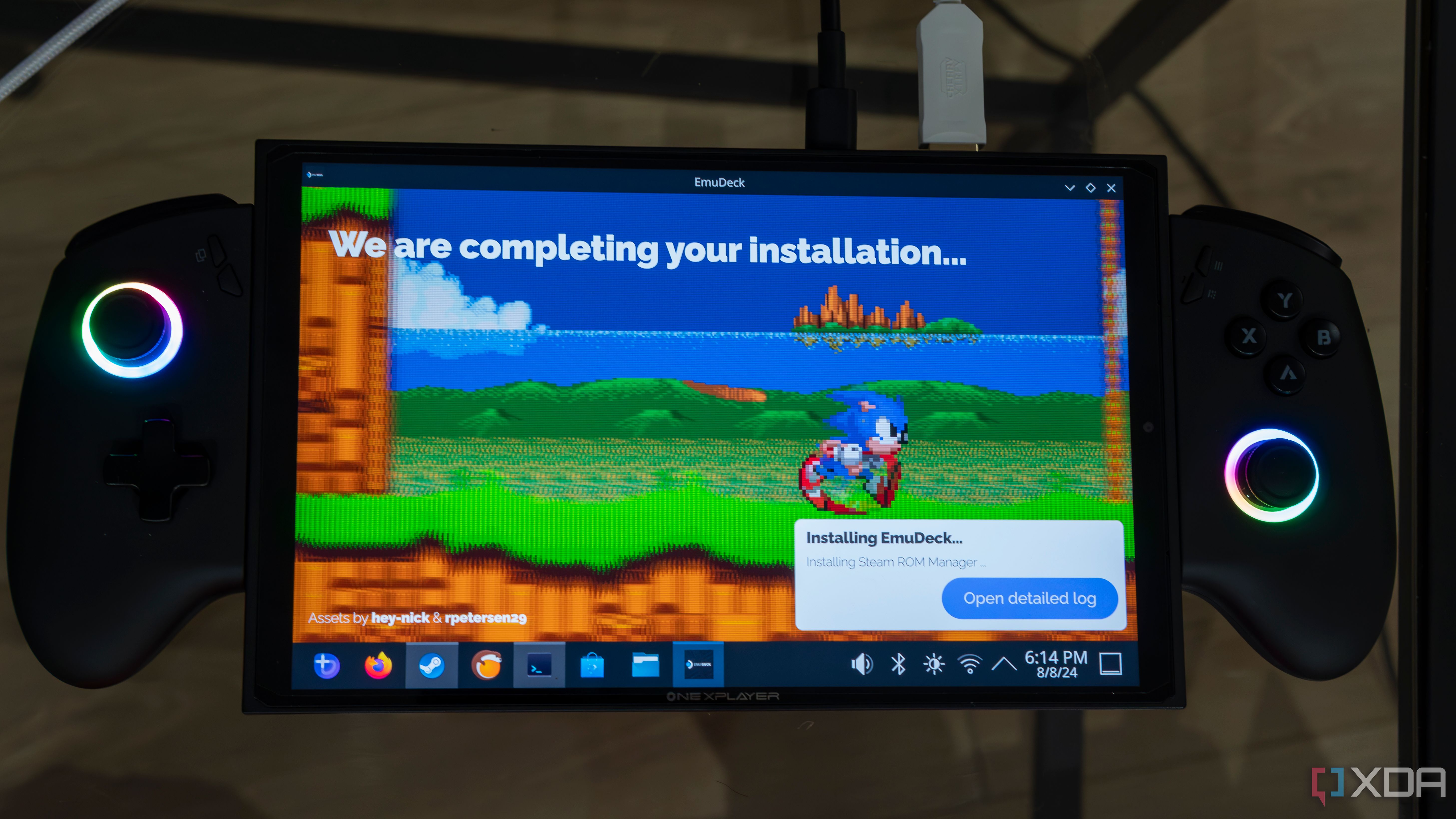 A ONEXPLAYER X1 Mini gaming handheld displaying the installation screen for EmuDeck