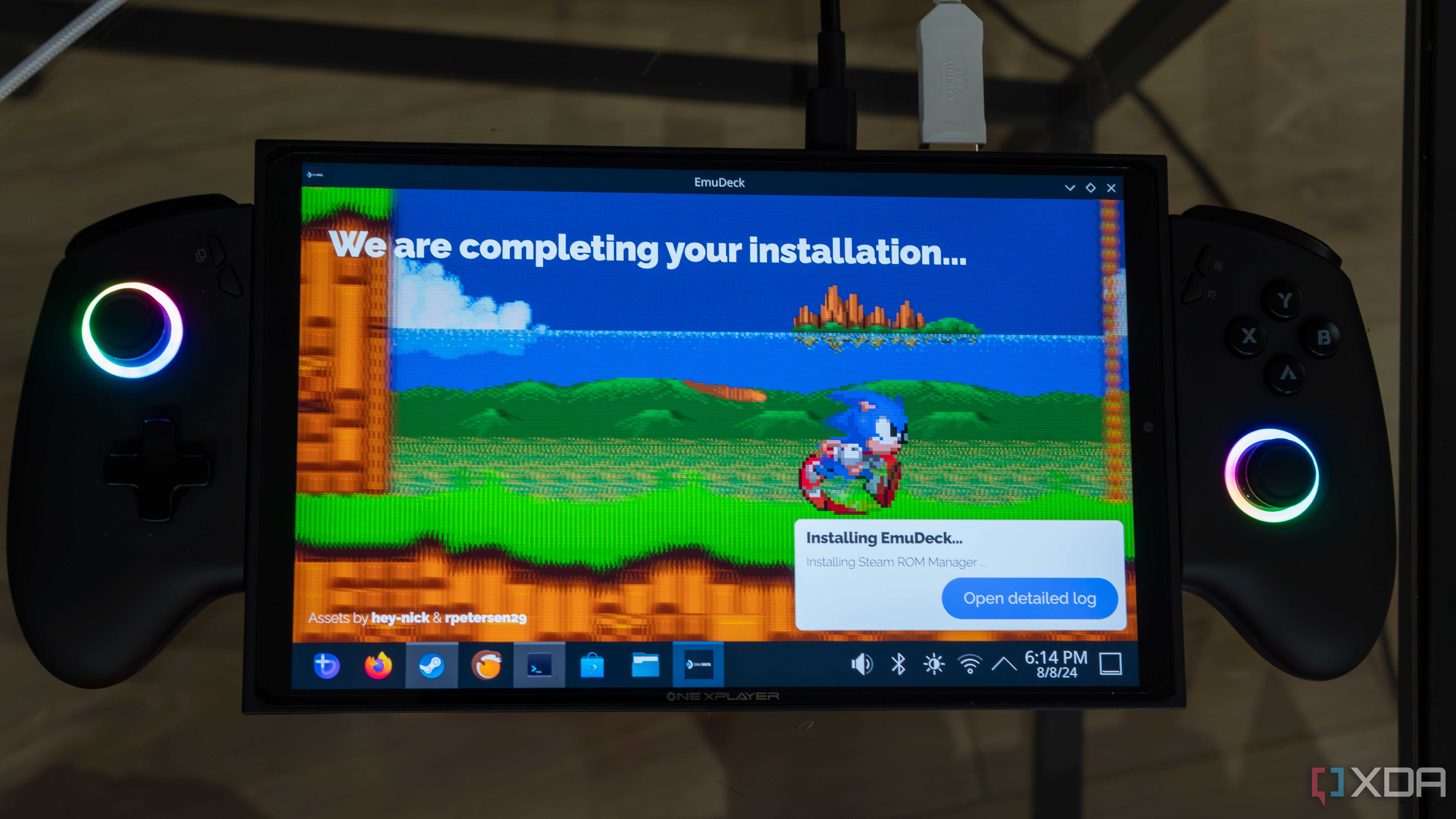 A ONEXPLAYER X1 Mini gaming handheld displaying the installation screen for EmuDeck