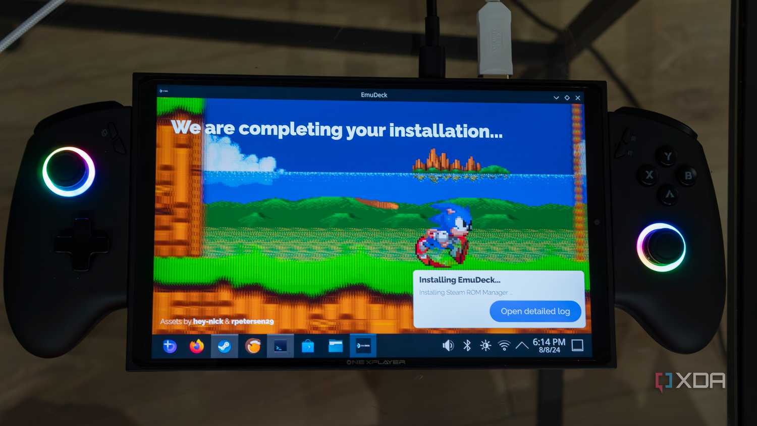 A ONEXPLAYER X1 Mini gaming handheld displaying the installation screen for EmuDeck