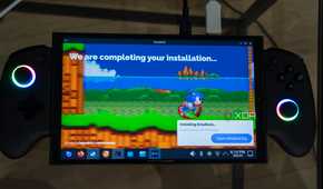 A ONEXPLAYER X1 Mini gaming handheld displaying the installation screen for EmuDeck