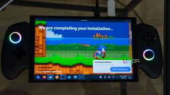 A ONEXPLAYER X1 Mini gaming handheld displaying the installation screen for EmuDeck