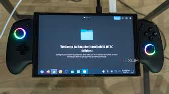 A ONEXPLAYER X1 Mini gaming handheld displaying the first-time welcoming experience on the KDE desktop