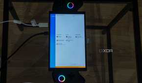 A ONEXPLAYER X1 Mini gaming handheld displaying the setup settings for Bazzite before beginning installation