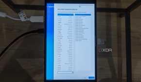 A ONEXPLAYER X1 Mini gaming handheld displaying the language selection in Bazzite