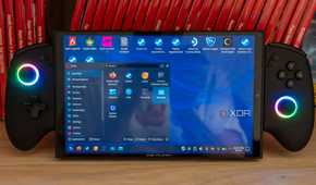 A ONEXPLAYER X1 Mini gaming handheld displaying the KDE desktop environment with the Applications menu open