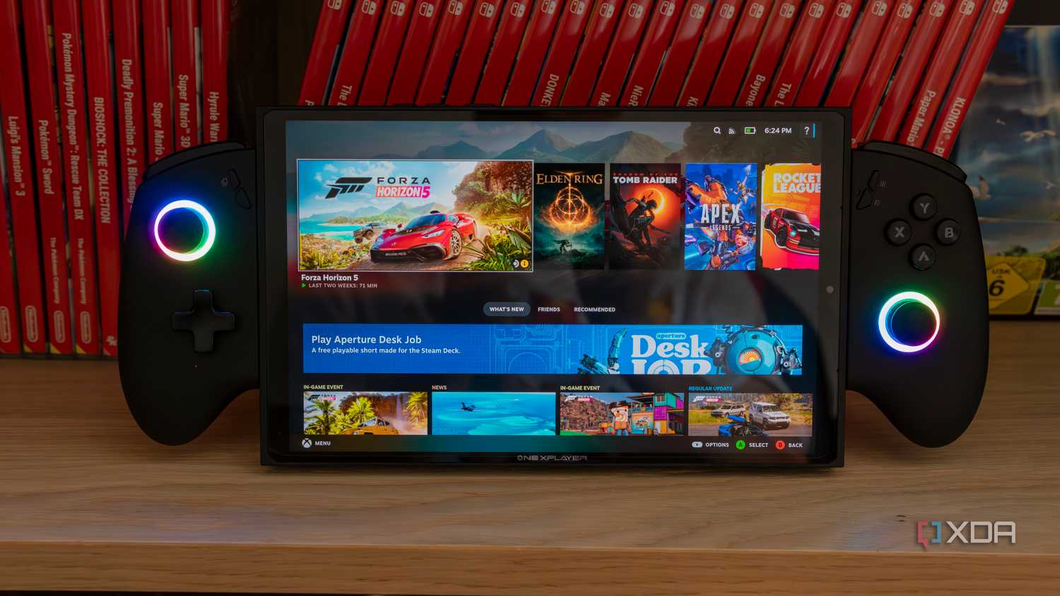 A ONEXPLAYER X1 Mini gaming handheld displaying the Steam gaming UI homepage