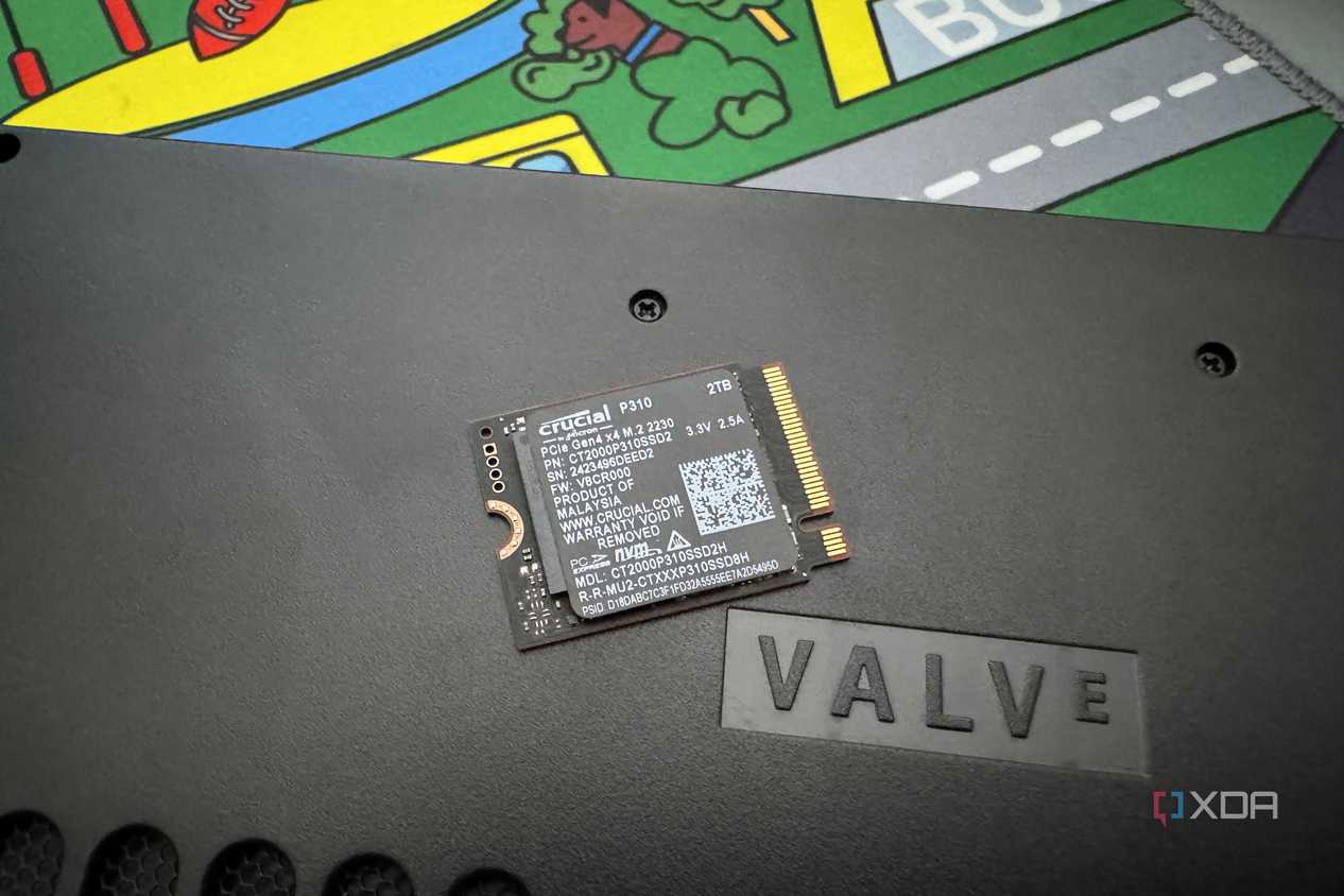 crucial p310 ssd on steam deck next to word valve