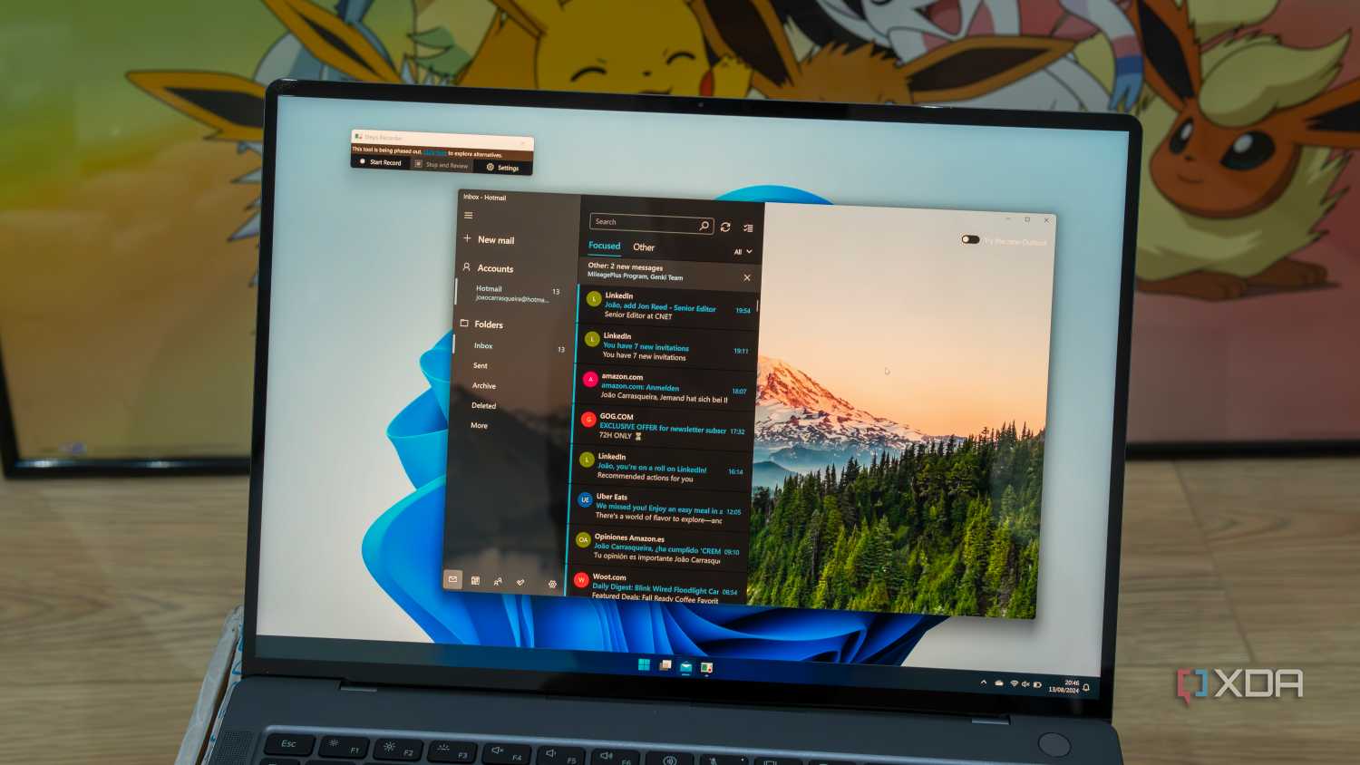 Windows 11 laptop running the Mail app and Steps Recorder