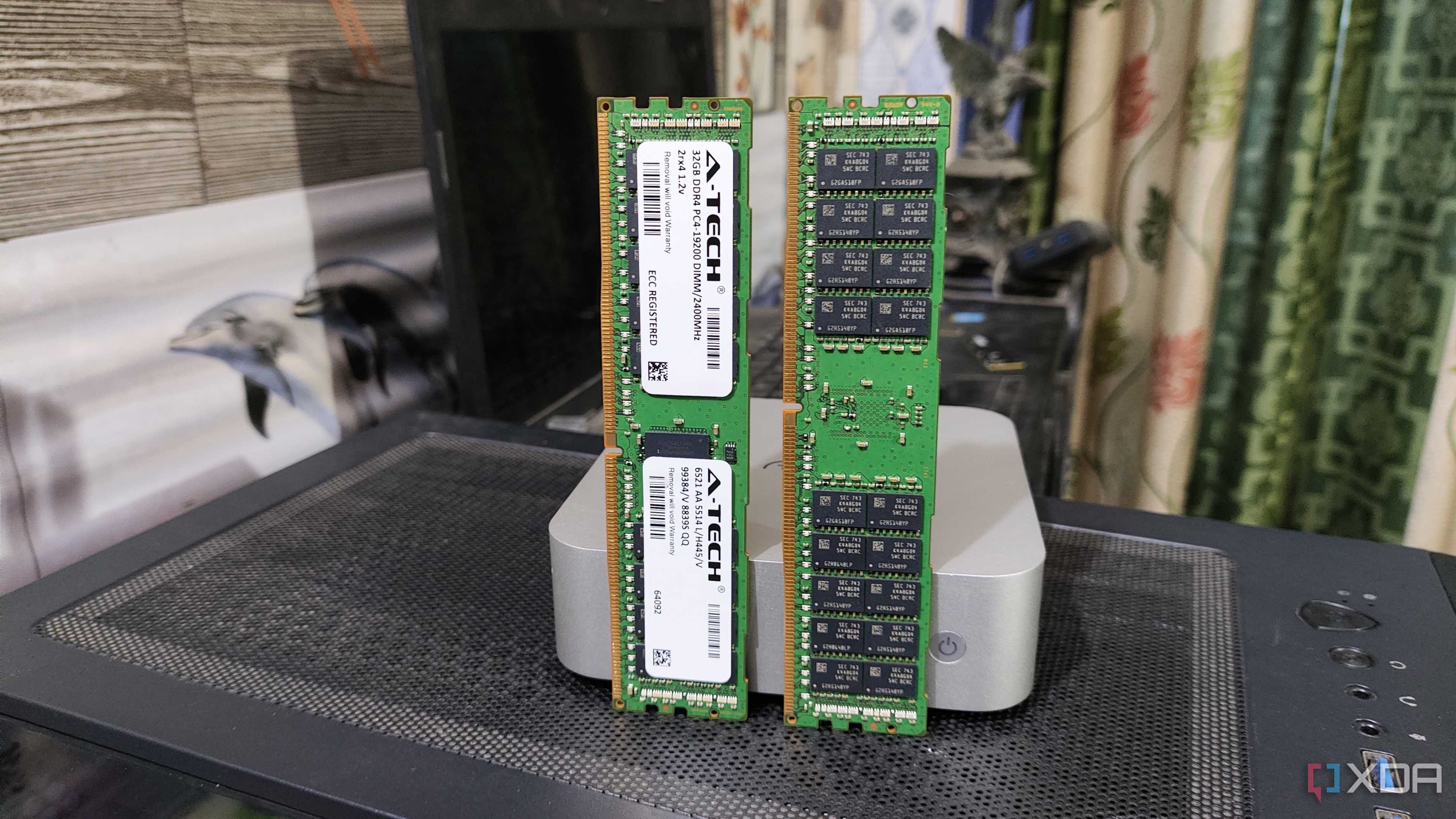 Two ECC memory sticks placed in front of an Aiffro K100 NAS