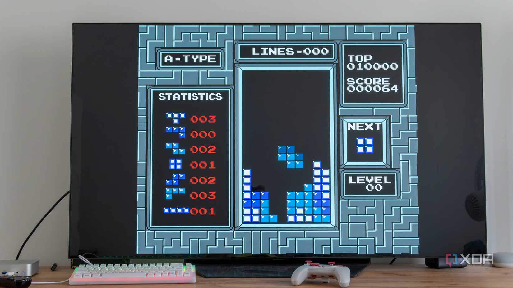 A TV displaying Tetris for the NES running in EmulationStation