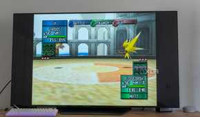 A TV display Pokémon Stadium 2 running in EmulationStation through RetroArch
