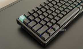 Angled close-up view of the left side of the Keychron K2 HE with RGB lighting enabled