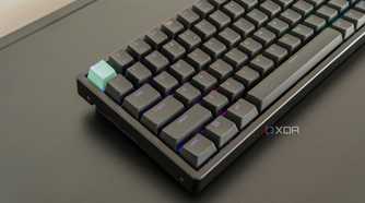 Angled close-up view of the left side of the Keychron K2 HE with RGB lighting enabled