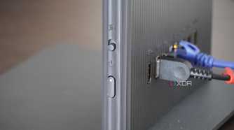 The power switch on the side of the Lenovo AIO.