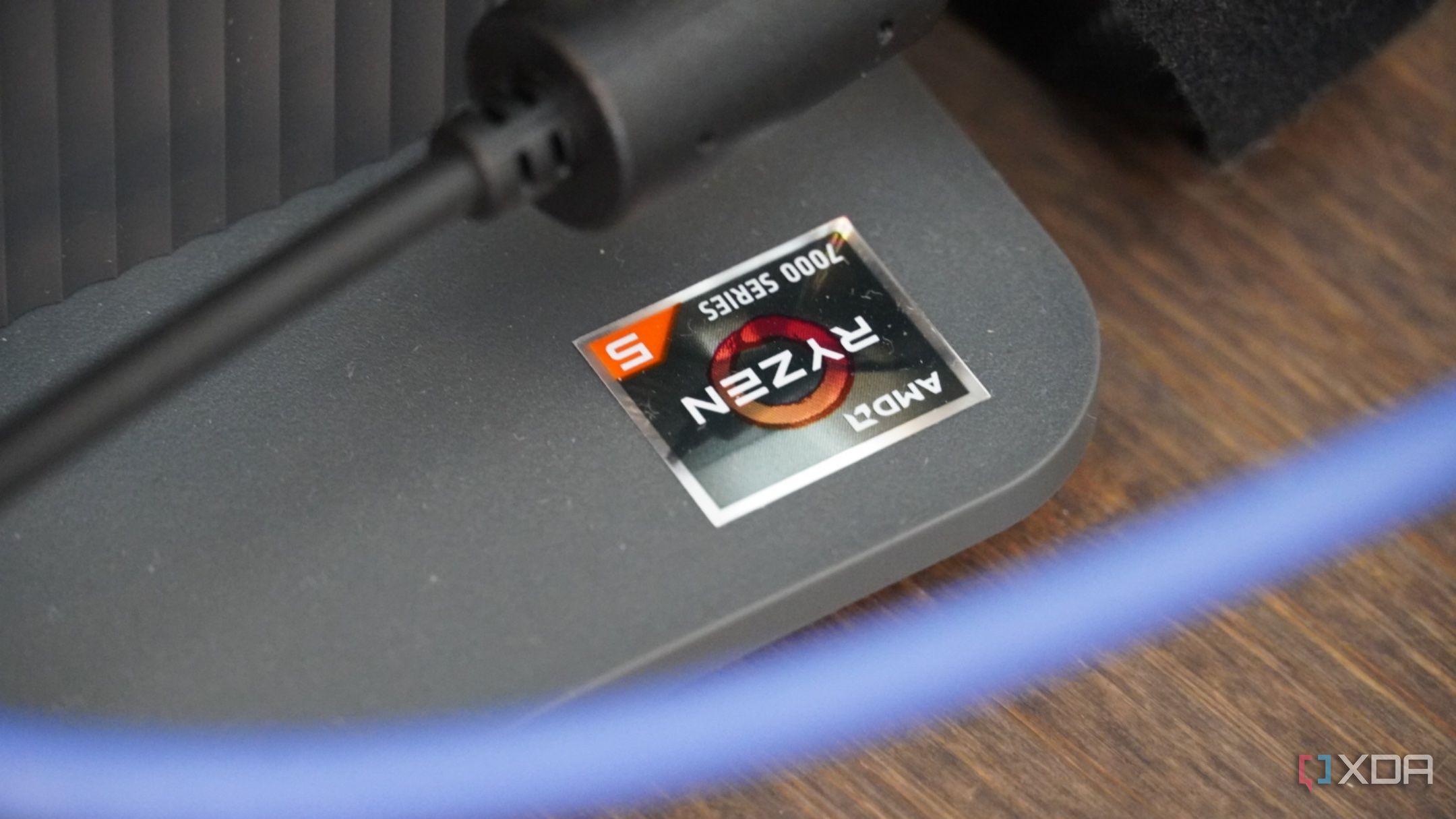 The AMD Ryzen badge on the Lenovo IdeaCenter AIO base.