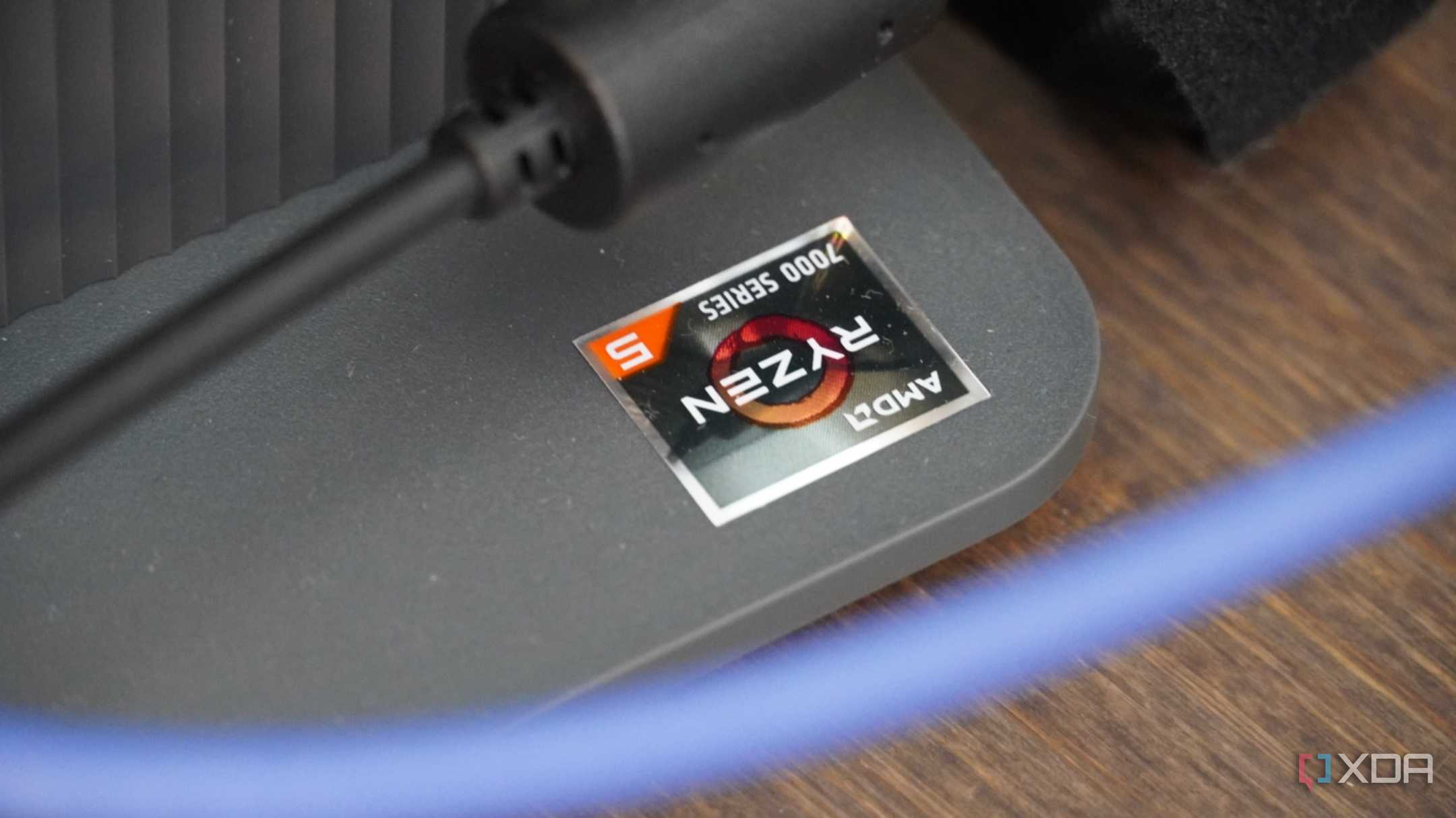 The AMD Ryzen badge on the Lenovo IdeaCenter AIO base.