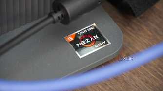 The AMD Ryzen badge on the Lenovo IdeaCenter AIO base.