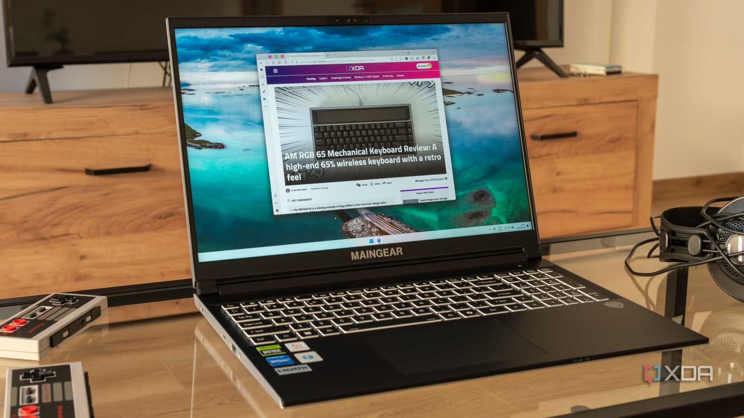 Angled view of a Maingear ML-16 2024 laptop on a glass table