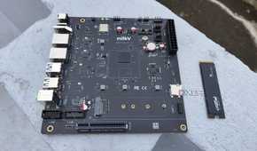 The K1 version of the Milk-V Jupiter mini-ITX motherboard with a PCIe 3.0 SSD lying nearby
