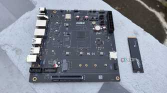The K1 version of the Milk-V Jupiter mini-ITX motherboard with a PCIe 3.0 SSD lying nearby