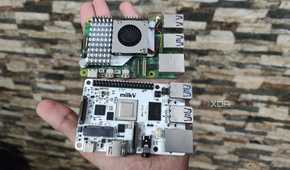A person holding a Raspberry Pi 5 and a Milk-V Mars