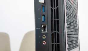 Close-up view of the USB, Ethernet, and audio ports on the back of the Minisforum AtomMan G7 Pt