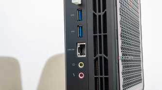 Close-up view of the USB, Ethernet, and audio ports on the back of the Minisforum AtomMan G7 Pt