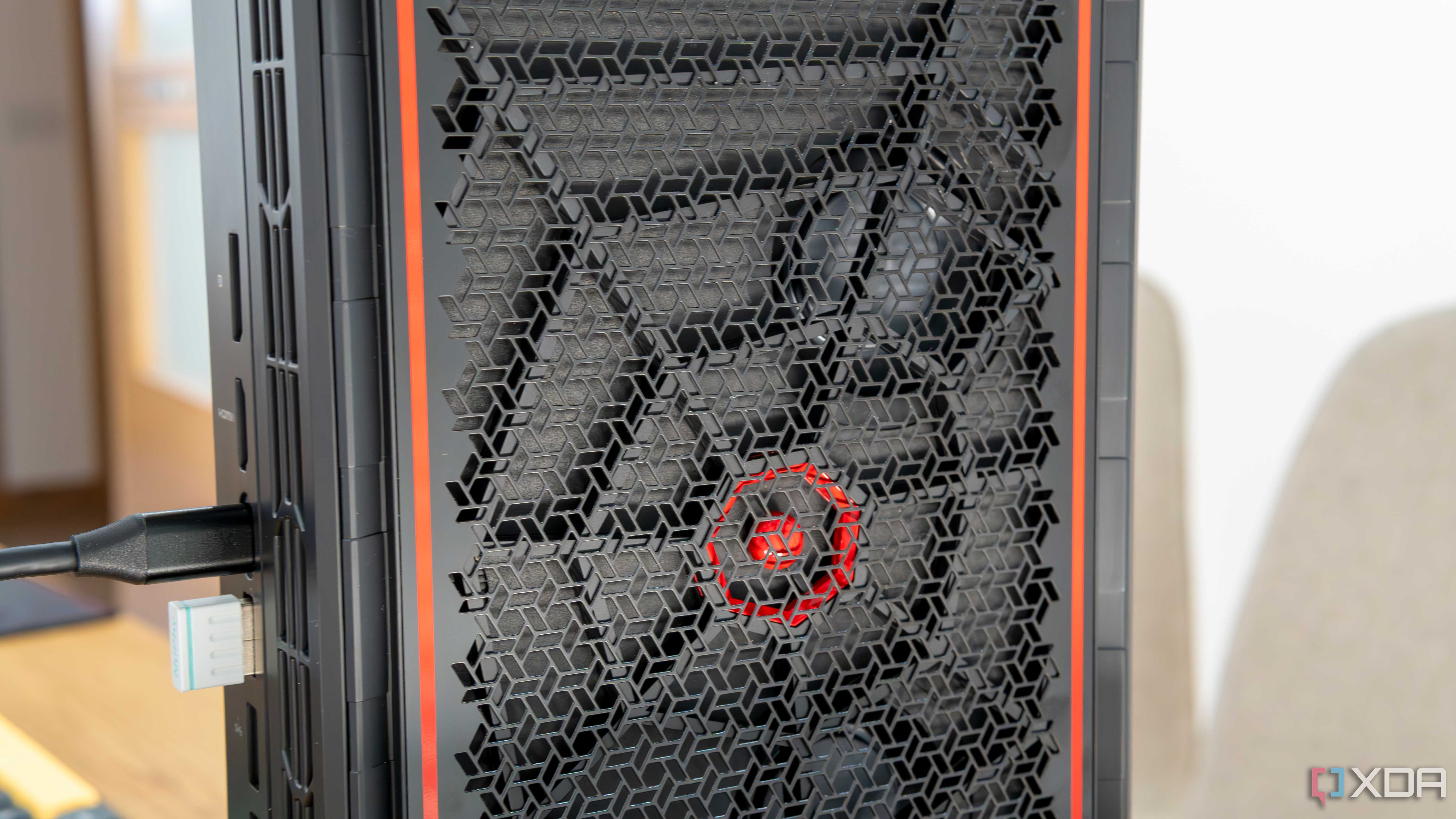 Close-up view of the side intake vent on the Minisforum AtomMan G7 Pt