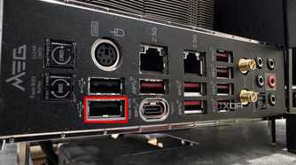 rear io panel of msi z690 unify-x motherboard with the bios flashback port highlighted