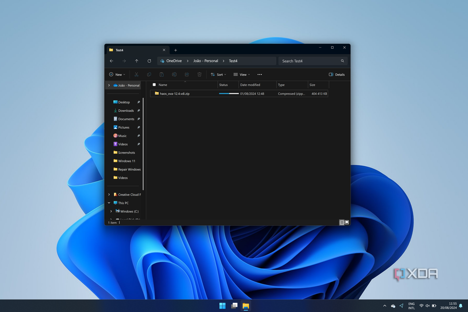 Screenshot of OneDrive in File Explorer while a file is downloading