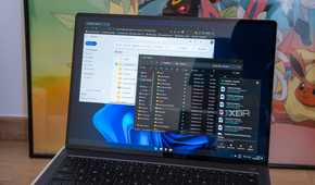 A Windows 11 laptop showing various interfaces for OneDrive