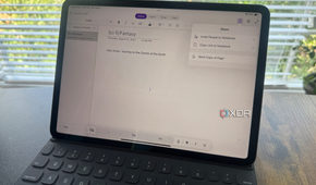 Photo of an ipad on a desktop with OneNote app open