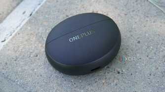 The OnePlus Buds Pro 3 case on a concrete bench.