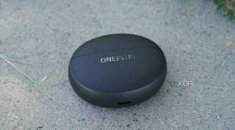 The OnePlus Buds Pro 3 case on a concrete bench.