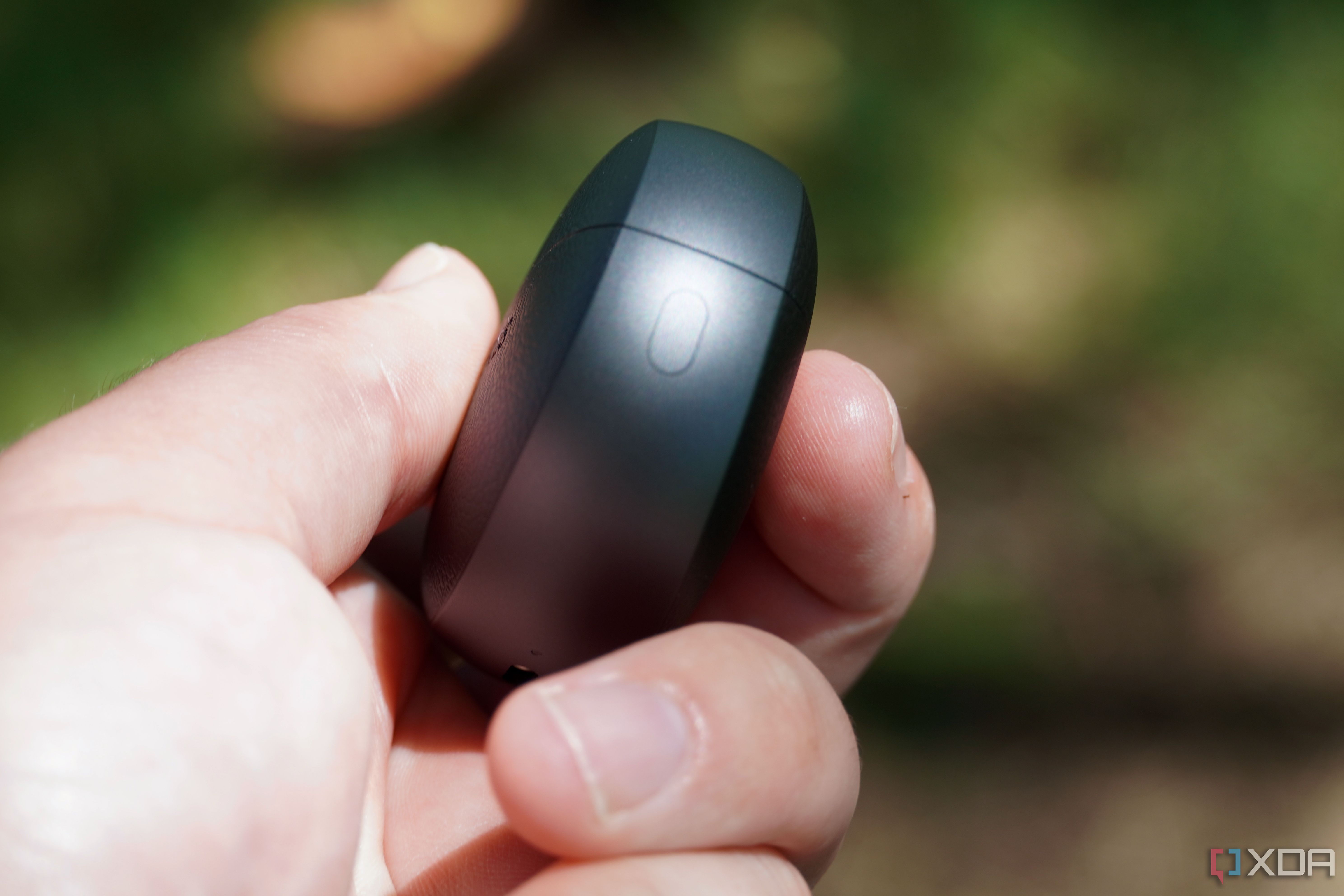 The button on the side of the OnePlus Buds Pro 3.