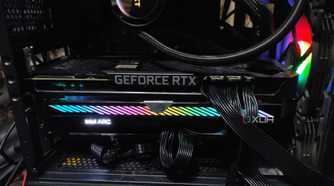 An RTX 3080 Ti and an Intel Arc A750 slotted into a PC