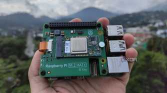 A person holding the Raspberry Pi AI Kit
