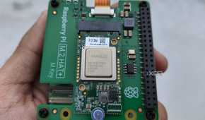 A person holding the Raspberry Pi AI Kit