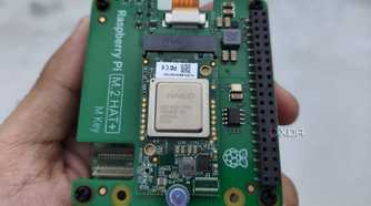 A person holding the Raspberry Pi AI Kit