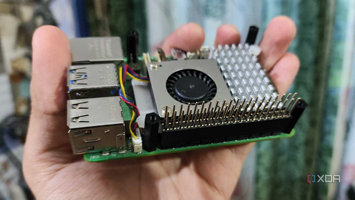 The Raspberry Pi 5 is small enough to easily hold it in your hand