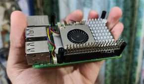 The Raspberry Pi 5 is small enough to easily hold it in your hand