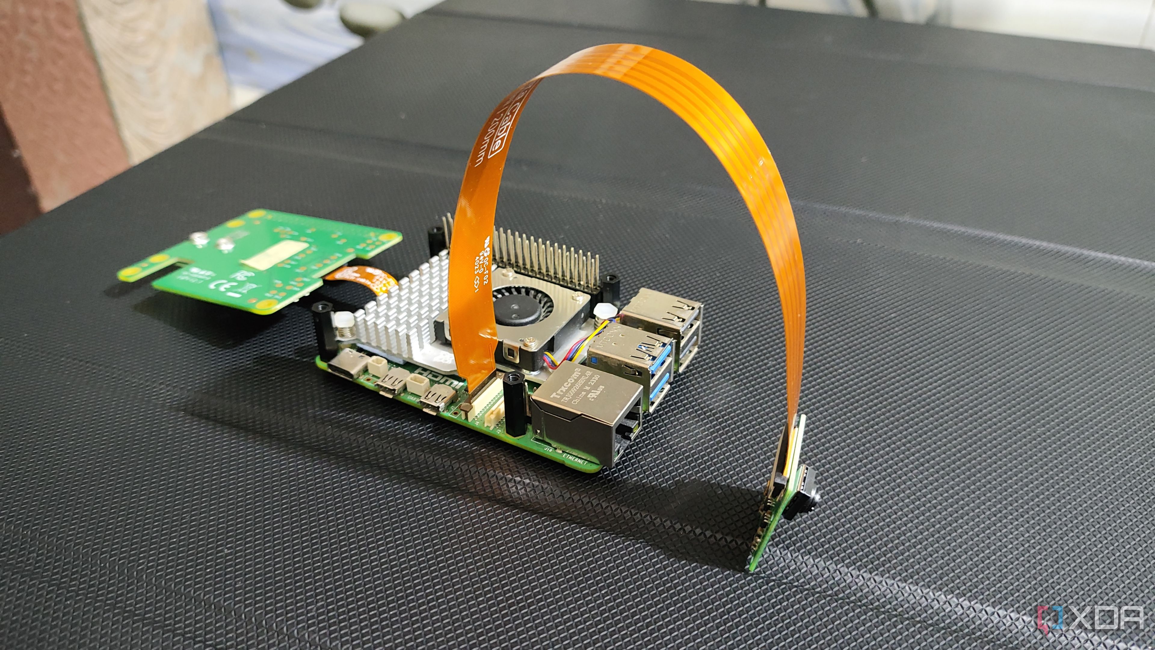 The Raspberry Pi AI Kit connected to a camera module