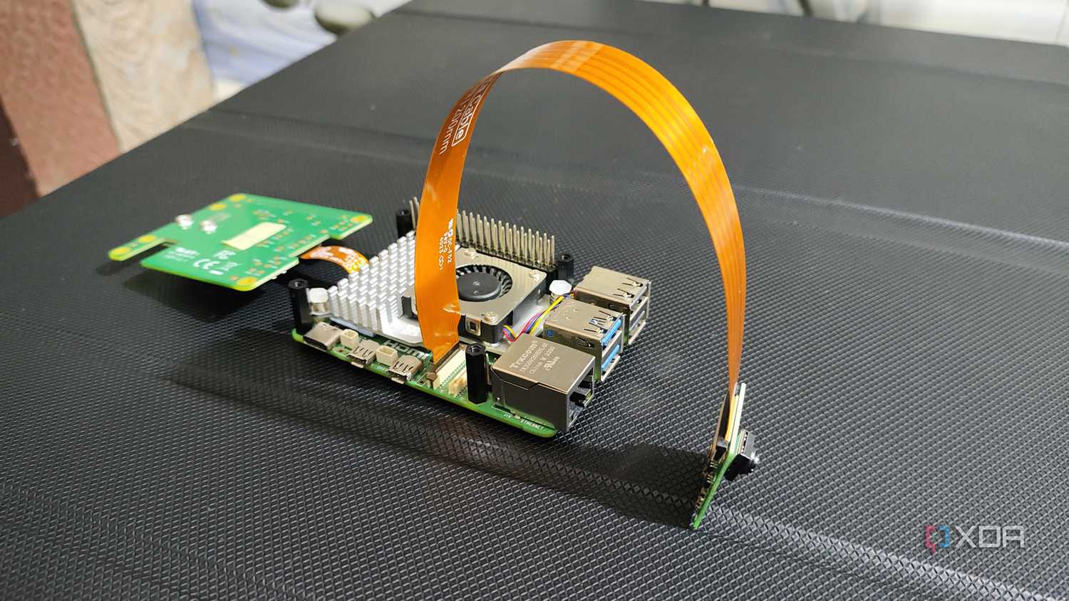 The Raspberry Pi AI Kit connected to a camera module