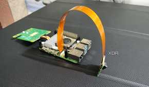 The Raspberry Pi AI Kit connected to a camera module