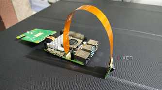 The Raspberry Pi AI Kit connected to a camera module