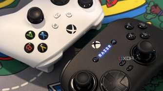 razer wolverine v3 pro controller close up next to white xbox controller