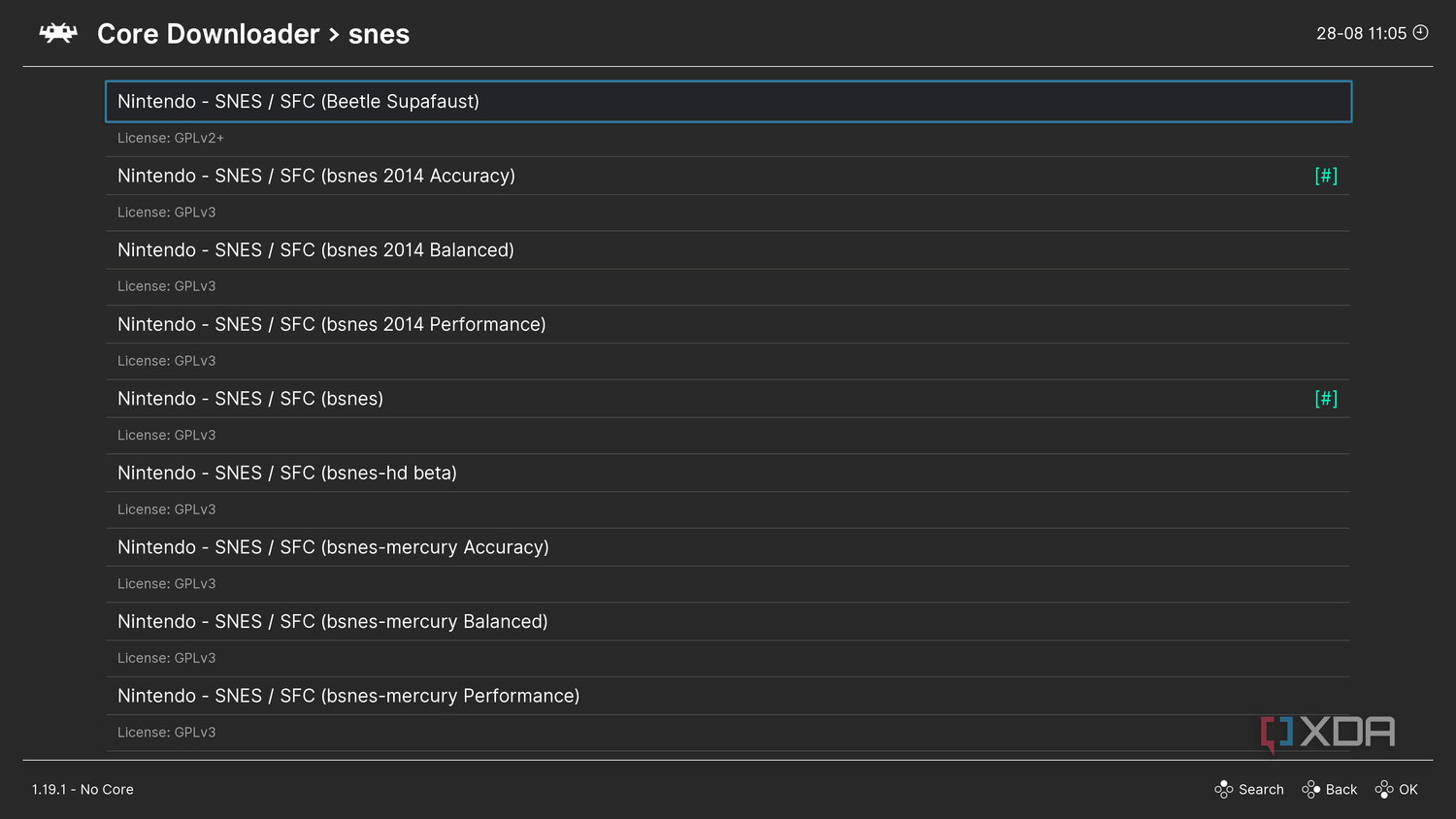 Screenshot of the core downloader UI in RetroArch showing results for SNES